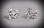 Custom made 100% pure silver lapel pins or cuff links, designs vary. Pins $30.00, Cuff links $70.00